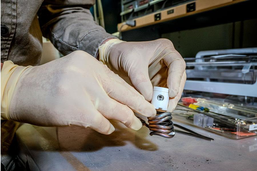 Photo of using oven to heat titantiam samples